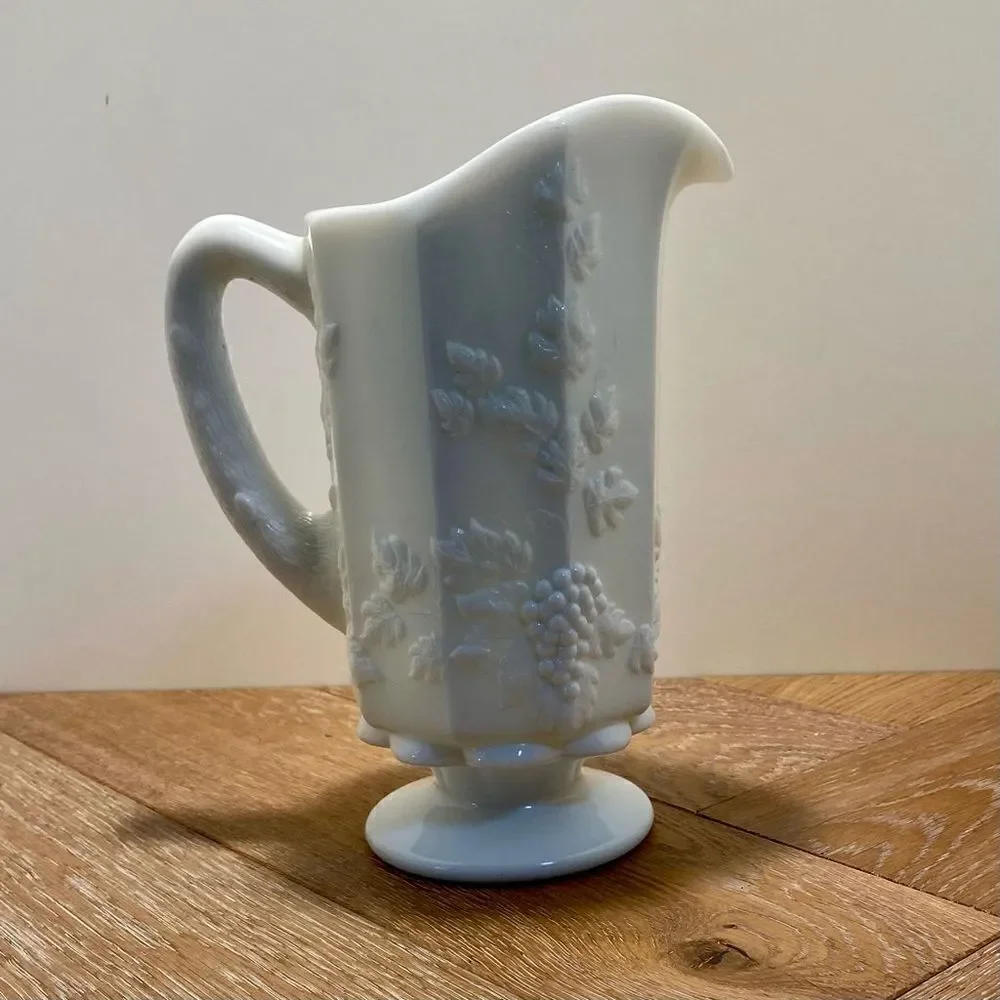 Vintage Pedestal Milk Glass Handled Pitcher 9” Tall Grapes & Leaves